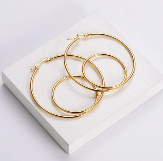 Her Golden Geometric Hoops